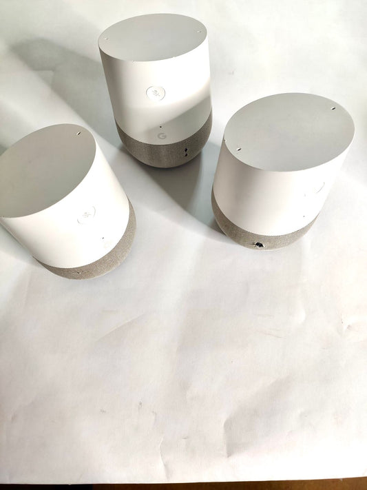 Google Home device promotional torn with original power adopter
